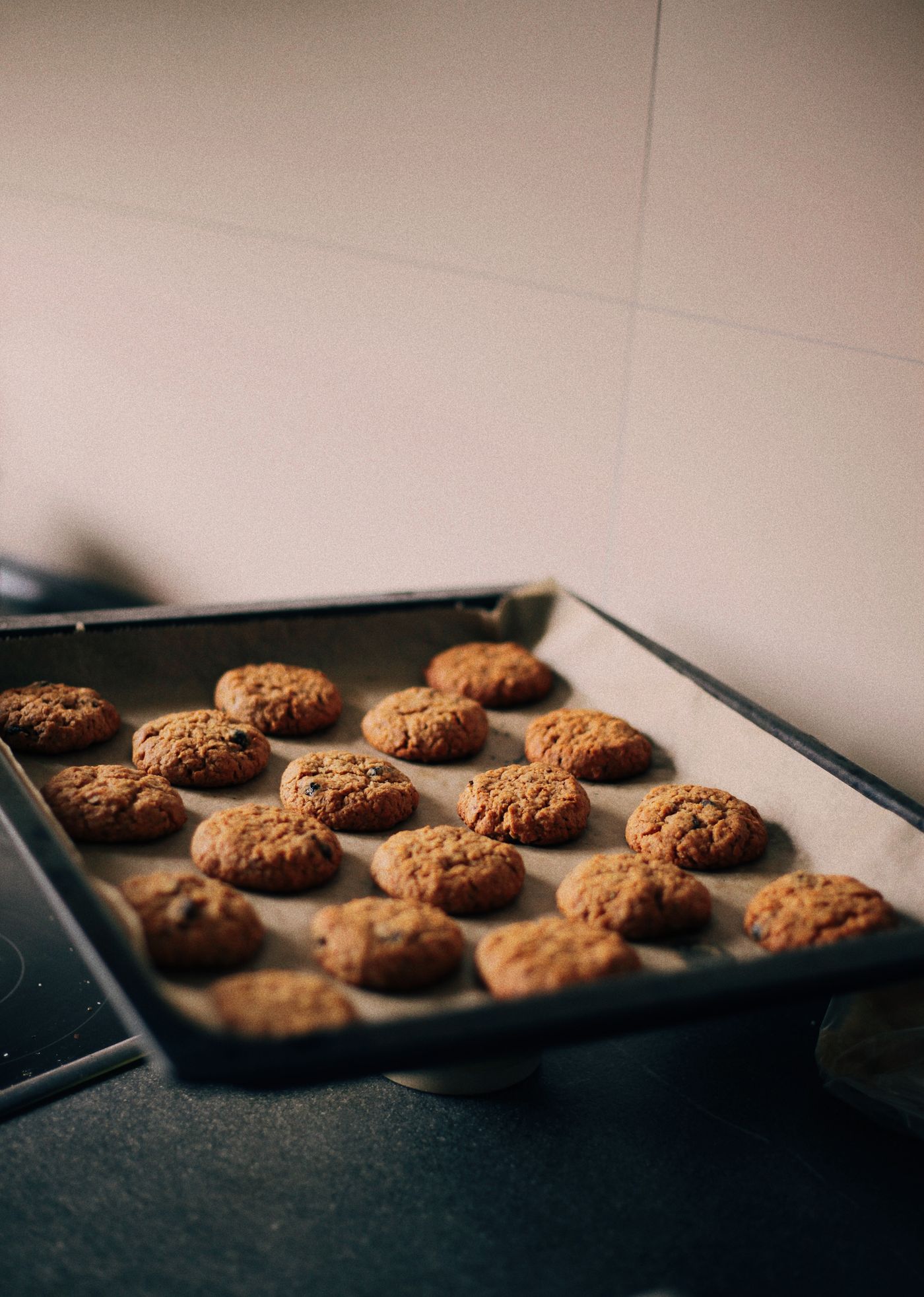 A tray of baked cookies in a kitchen